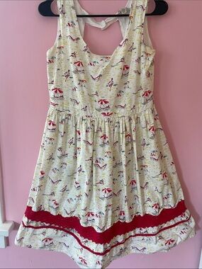 Yumi Beach-Print Sleeveless Casual Dress with Red Trim